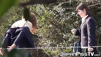 Japanese Schoolgirls Enjoy Each Other And Pee Outdoors